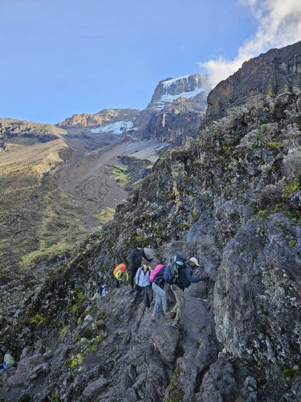 Climbing Kilimanjaro during a safari with Caracal Tours & Safaris in Tanzania