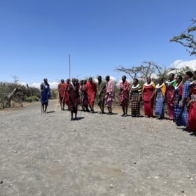 Maasai welcome in Osiligilai Maasai Lodge in West Kilimanjaro with Caracal Tours and Safaris, Tanzania